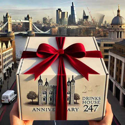 Narez Organic Vodka 70cl gift box with red ribbon, London skyline in background.