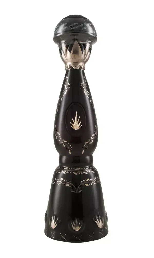 Clase Azul Ultra Añejo 70cl – ultra-premium tequila in a black bottle with platinum and gold embellishments.