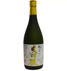 Bottle of Japanese sake with a gold cap on a white background