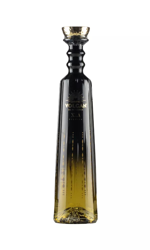 Sleek 70cl bottle of Volcan De Mi Tierra X.A Tequila, 40% ABV, featuring a glowing volcanic design. This blended tequila offers a smooth, rich taste with agave and caramel notes.