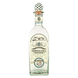 Clear bottle of Fortaleza Blanco Tequila with decorative stopper and label.