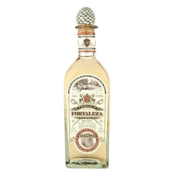 Fortaleza Reposado Tequila bottle with pinecone stopper.