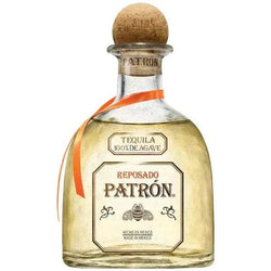 Bottle of Patron Reposado Rested Tequila with cork top and orange ribbon.