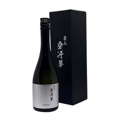 Bottle of black wine with a matching black box on a white background