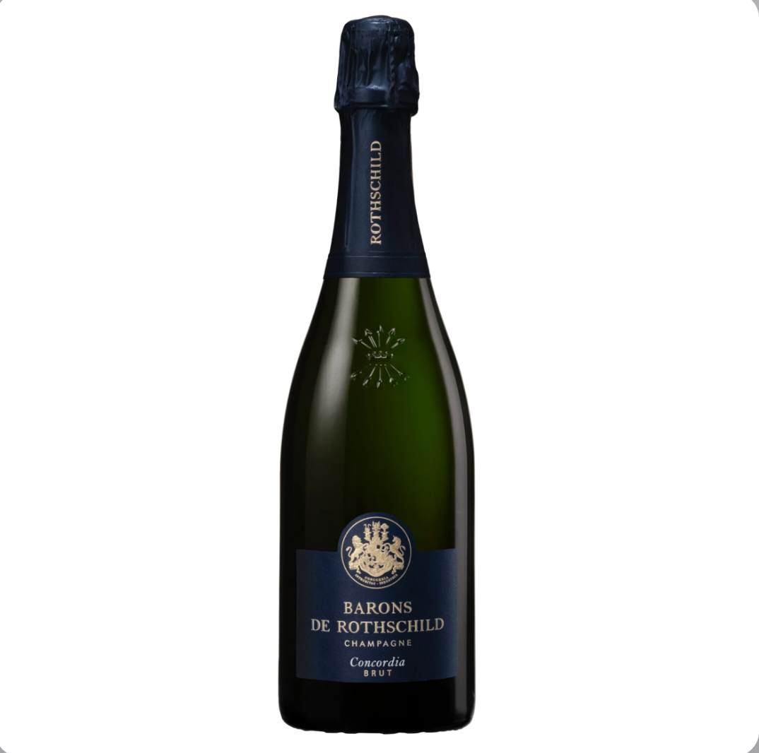 Elegant dark green bottle of Barons de Rothschild Concordia Brut NV Champagne (75cl), featuring a deep navy blue foil capsule with "ROTHSCHILD" in gold vertical lettering. The label is predominantly navy blue with a central gold-embossed heraldic crest (crowned coat of arms with lions), gold text reading "BARONS DE ROTHSCHILD", "CHAMPAGNE", "Concordia", and "BRUT" in sophisticated serif font. A small gold starburst emblem sits above the crest.