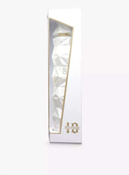 Tall, narrow white gift box with a gold-trimmed window displaying the ultra-premium Belvedere 10 vodka bottle. The bottle has a striking faceted, geometric, crystalline white glass design resembling a faceted diamond or modern sculpture, with embossed "B" letters on multiple facets and a gold foil band at the neck reading "BELVEDERE".