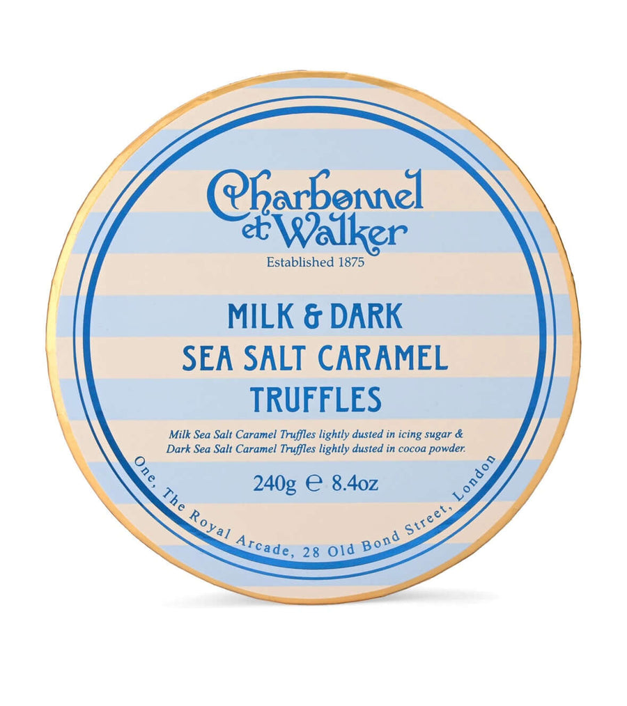 Tin of Charbonnel et Walker milk and dark sea salt caramel truffles on a white background