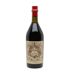 A vintage bottle of Cognac Armagnac, featuring a dark glass body, a red wax seal at the neck, and an ornate beige paper label with detailed black illustrations.