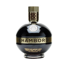 Chambord liqueur bottle with a glossy black body, gold lettering, and a textured gold cap on a white background.