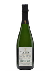A bottle of Telmont Reserve Brut non-alcoholic sparkling wine, featuring a dark green glass bottle, black foil, and a white label with black text.