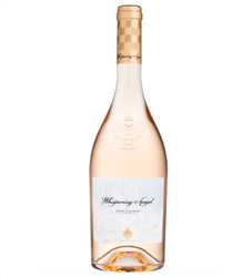 A bottle of Whispering Angel Rosé Champagne Non Alcoholic, featuring a pale pinkish-rose liquid, a white label with elegant black script, and a gold patterned neck foil, set against a plain white background.