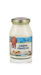 Jar of crème fraçèche with a British flag label on a white background
