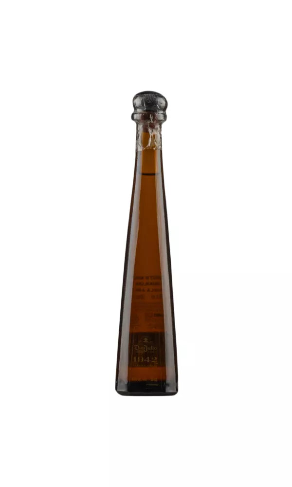 Miniature 5cl bottle of Don Julio 1942 Añejo Tequila, 40% ABV, with a sleek, elegant design. The golden-amber tequila is aged for 2.5 years, offering a luxurious, complex flavor.