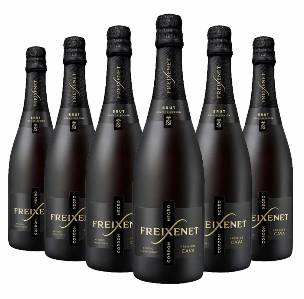 Six bottles of Freixenet Cava on a white background