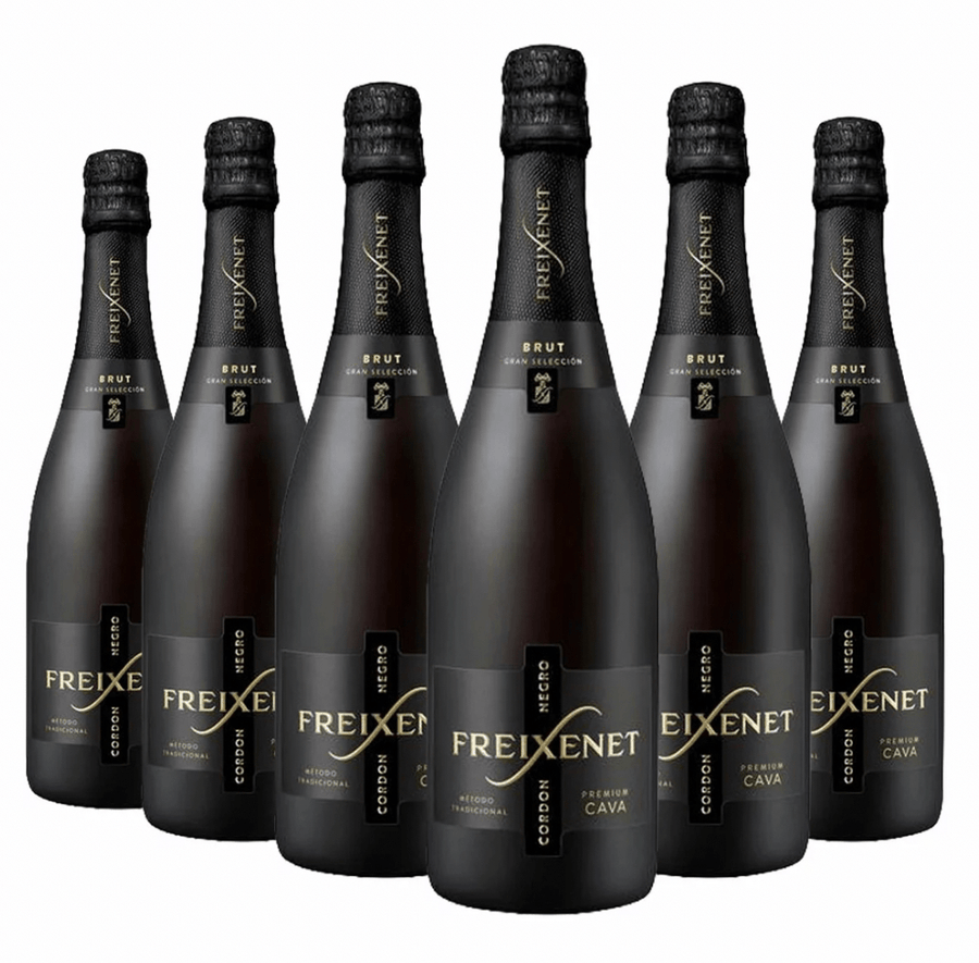 Six bottles of Freixenet Cava on a white background