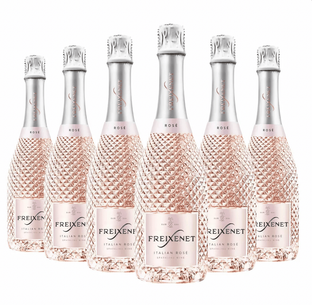 Six bottles of Freixenet rose sparkling wine on a white background