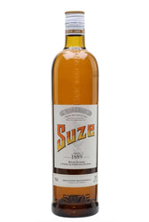 A bottle of Suze cognac liqueur with a white label and silver cap, filled with amber liquid, shown against a plain white background.