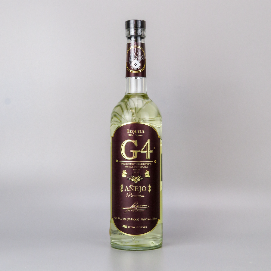 Bottle of G4 Añejo Tequila 70cl – amber-colored tequila in a glass bottle with a brown label, aged 18 months for rich flavor.