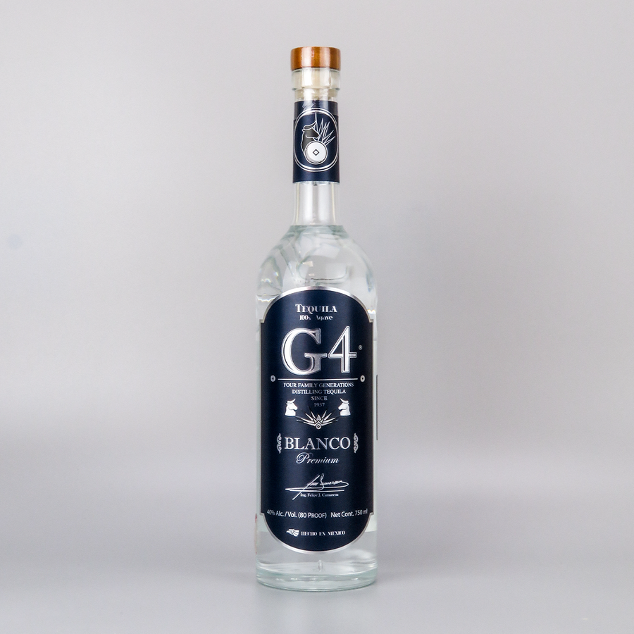 Bottle of G4 Blanco Tequila 70cl – clear tequila in a sleek glass bottle with a blue label, showcasing its unaged purity.