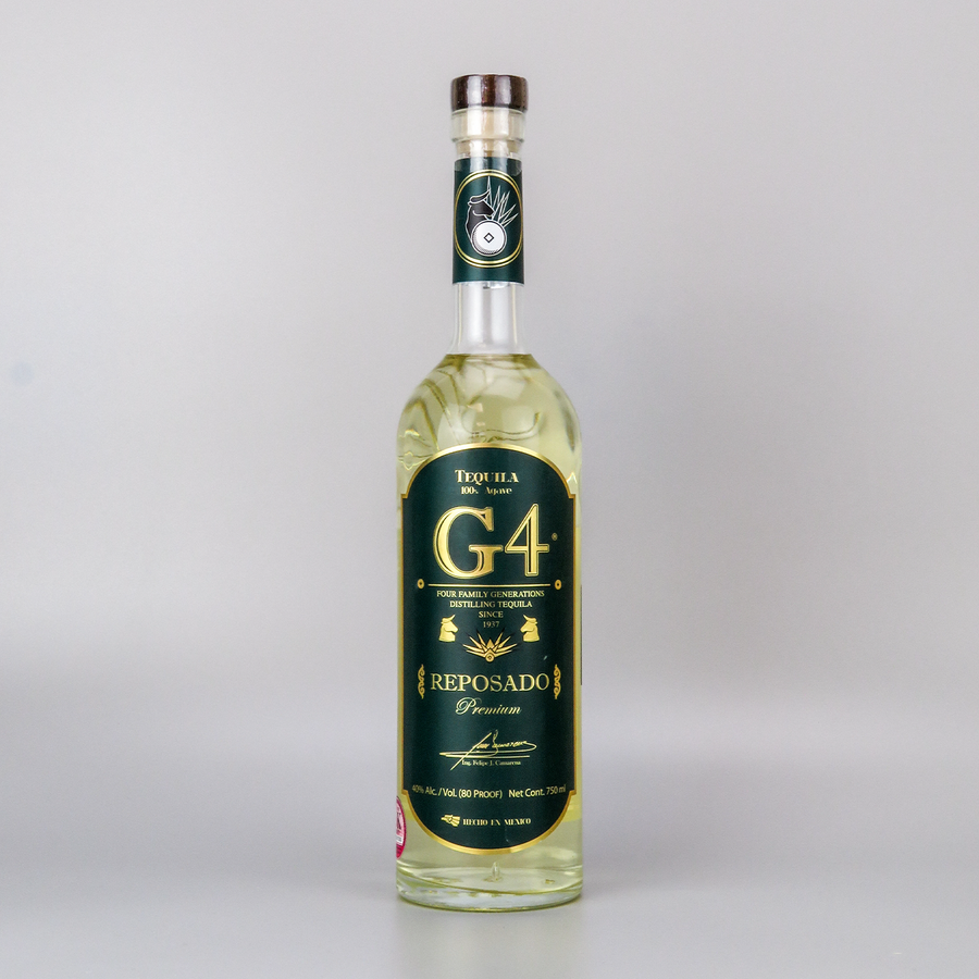 Bottle of G4 Reposado Tequila 70cl – light golden tequila in a glass bottle with a beige label, aged for 6 months in oak barrels.