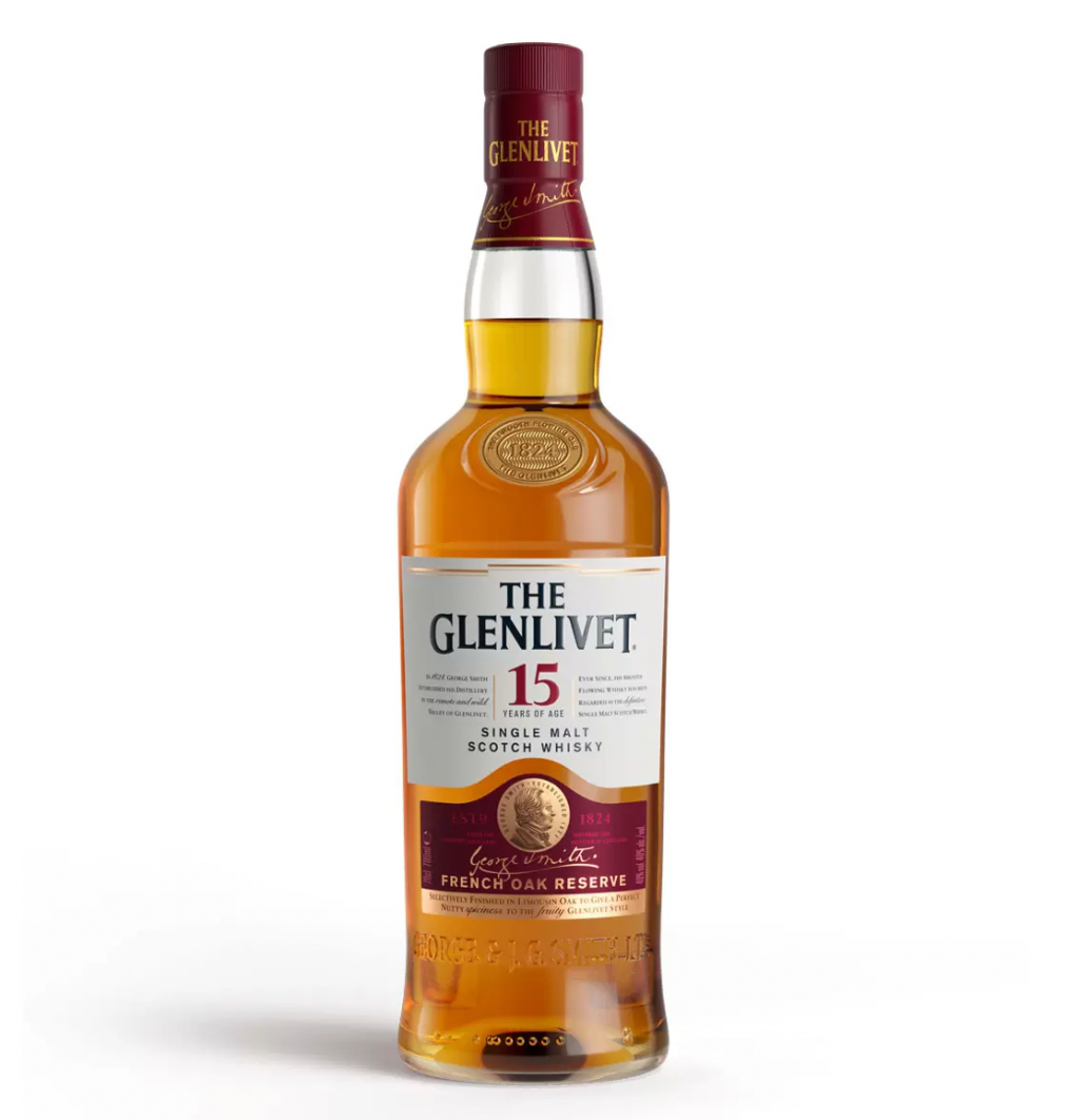 Tall, clear glass bottle of The Glenlivet 15 Year Old French Oak Reserve single malt Scotch whisky with rich golden-amber liquid. The bottle features a deep maroon/red foil capsule embossed with "THE GLENLIVET" in gold. The main label has a cream background with gold and maroon accents: "THE GLENLIVET" in large gold lettering at the top, "15" prominently displayed, and "FRENCH OAK RESERVE" in elegant script below.