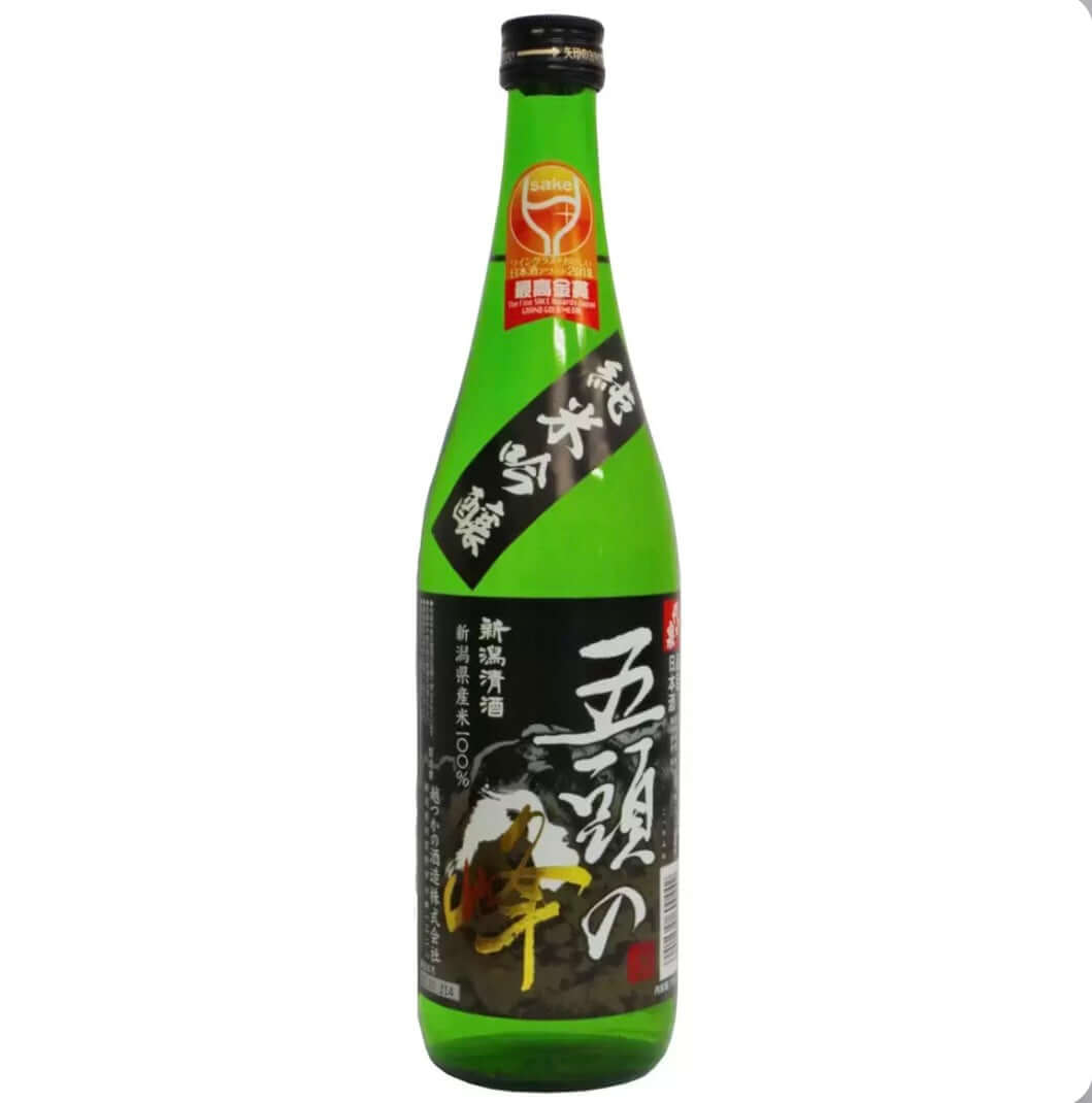 Green bottle with black label on a white background