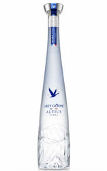 A bottle of Grey Goose Altius vodka on a plain white background, featuring a clear glass bottle with a faceted base, a blue goose logo, and a silver and blue neck cap.