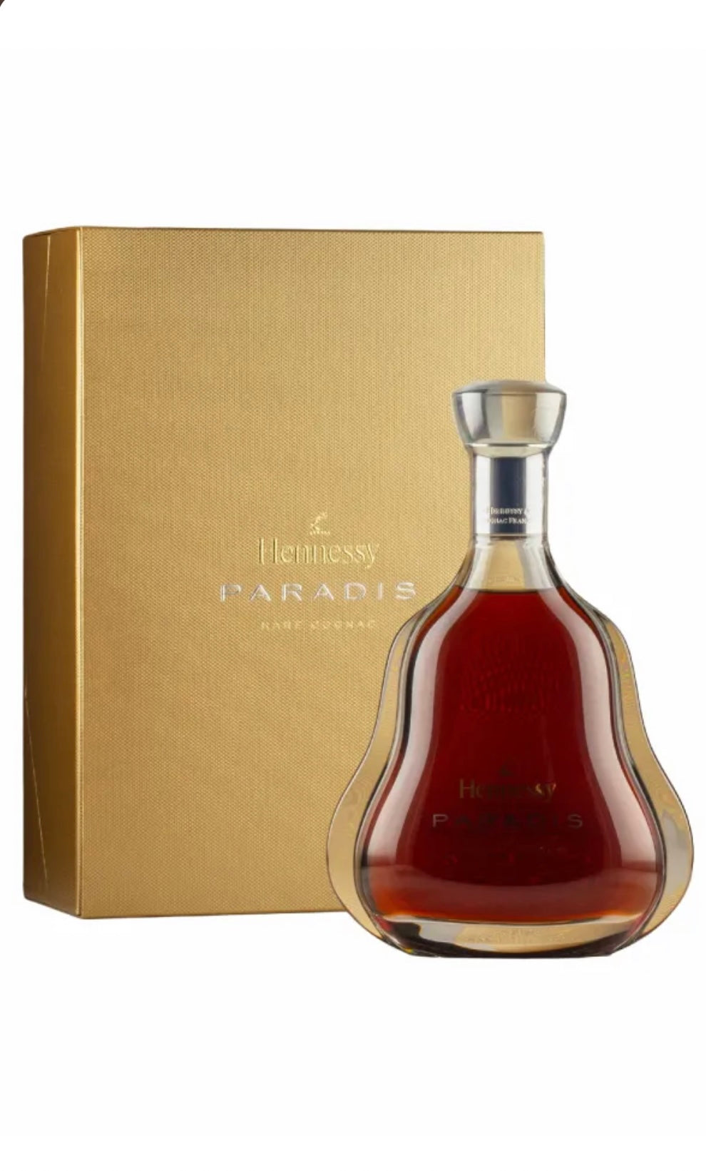 Hennessy Paradis cognac bottle with gold box on a white background