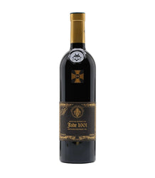 A bottle of Jude 1901 Bordeaux Superieur red wine, featuring a dark glass bottle with a gold foil capsule and a black label with gold detailing, set against a plain white background.