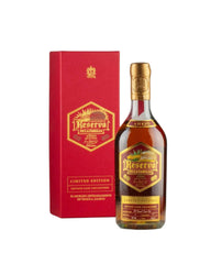 Bottle and red box of Reserva del Familiar limited edition rum on a white background