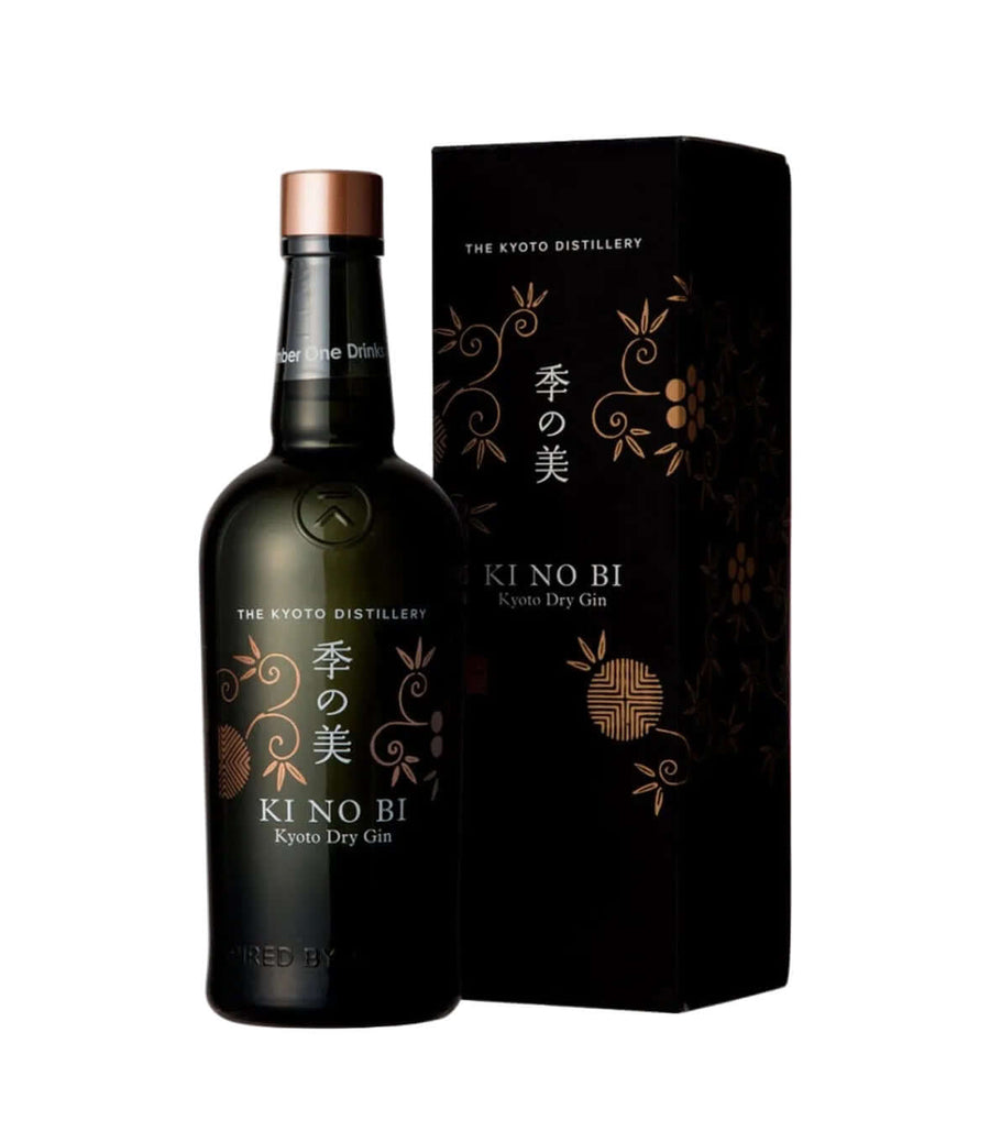 A bottle of Kyoto Distillery Ki No Bi Kyoto Dry Gin next to its black packaging box with gold floral patterns, on a white background.