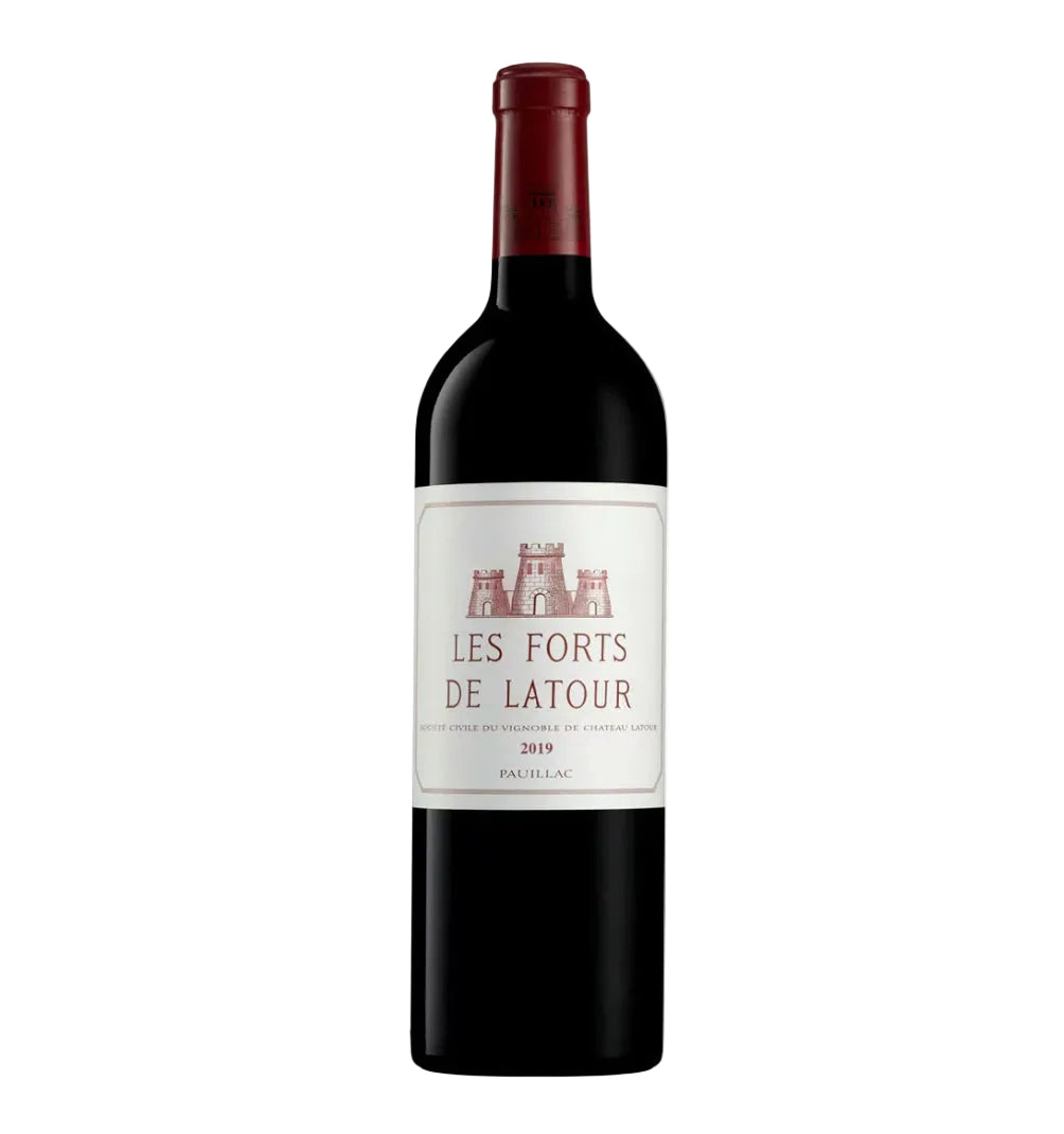 Deep red wine in a classic Bordeaux bottle of Les Forts de Latour Pauillac 2019 (75cl). The bottle has a red foil capsule with gold château emblem and text. 