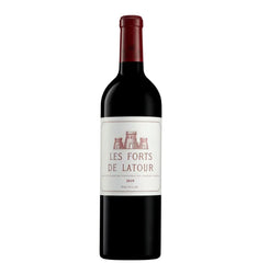 Deep red wine in a classic Bordeaux bottle of Les Forts de Latour Pauillac 2019 (75cl). The bottle has a red foil capsule with gold château emblem and text. 