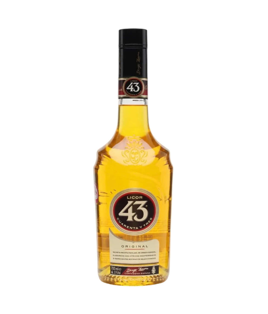 A bottle of Licor 43 Original agave rum spirit, featuring a clear glass bottle filled with golden amber liquid, a black cap, and a circular red and gold label, set against a plain white background.