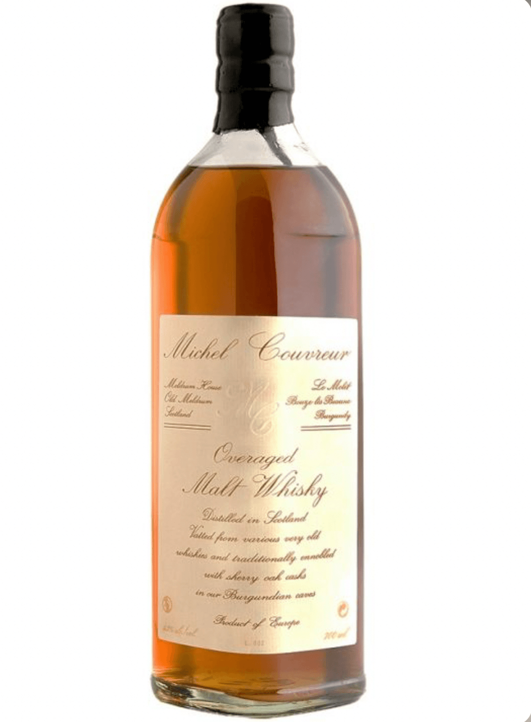 Bottle of Michel Courvoeur whisky on a white background