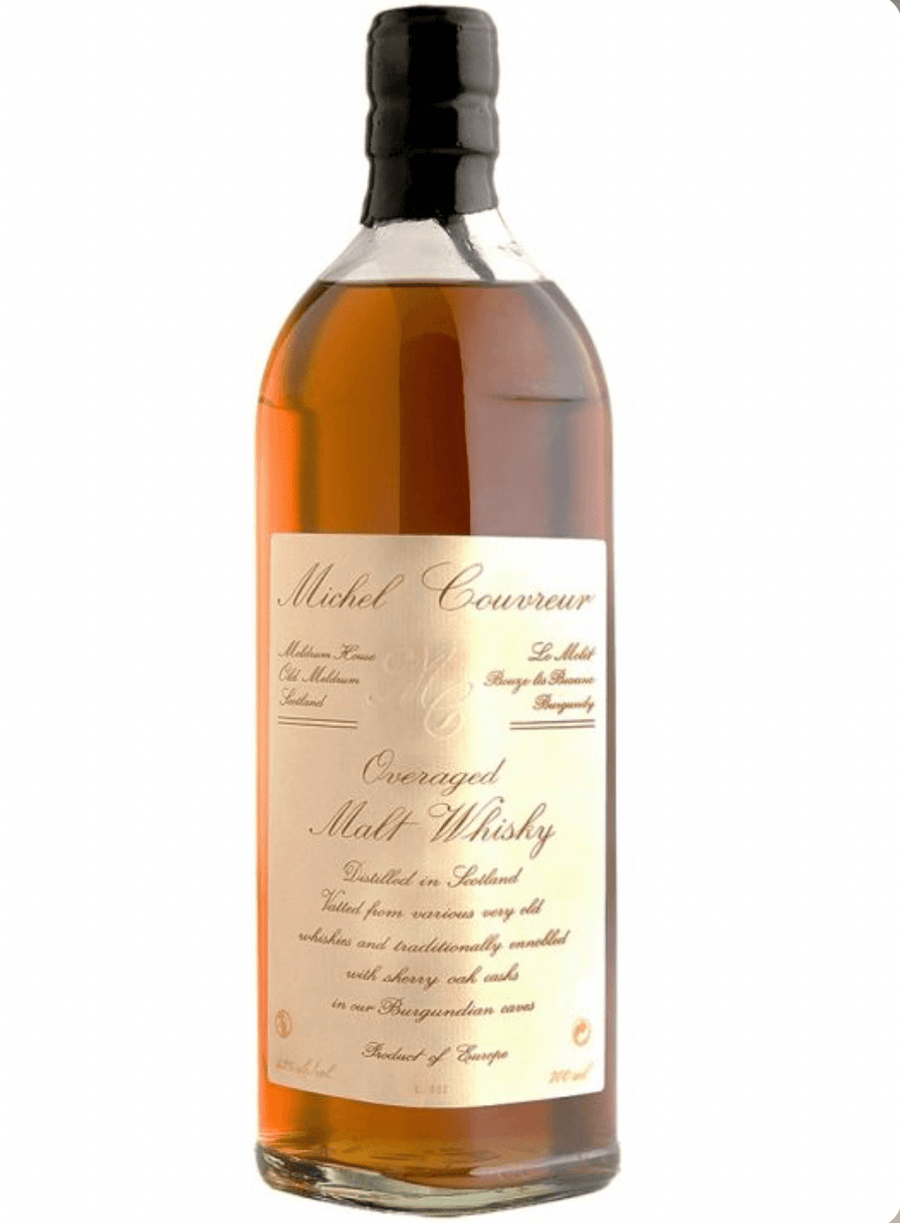 Bottle of Michel Courvoeur whisky on a white background