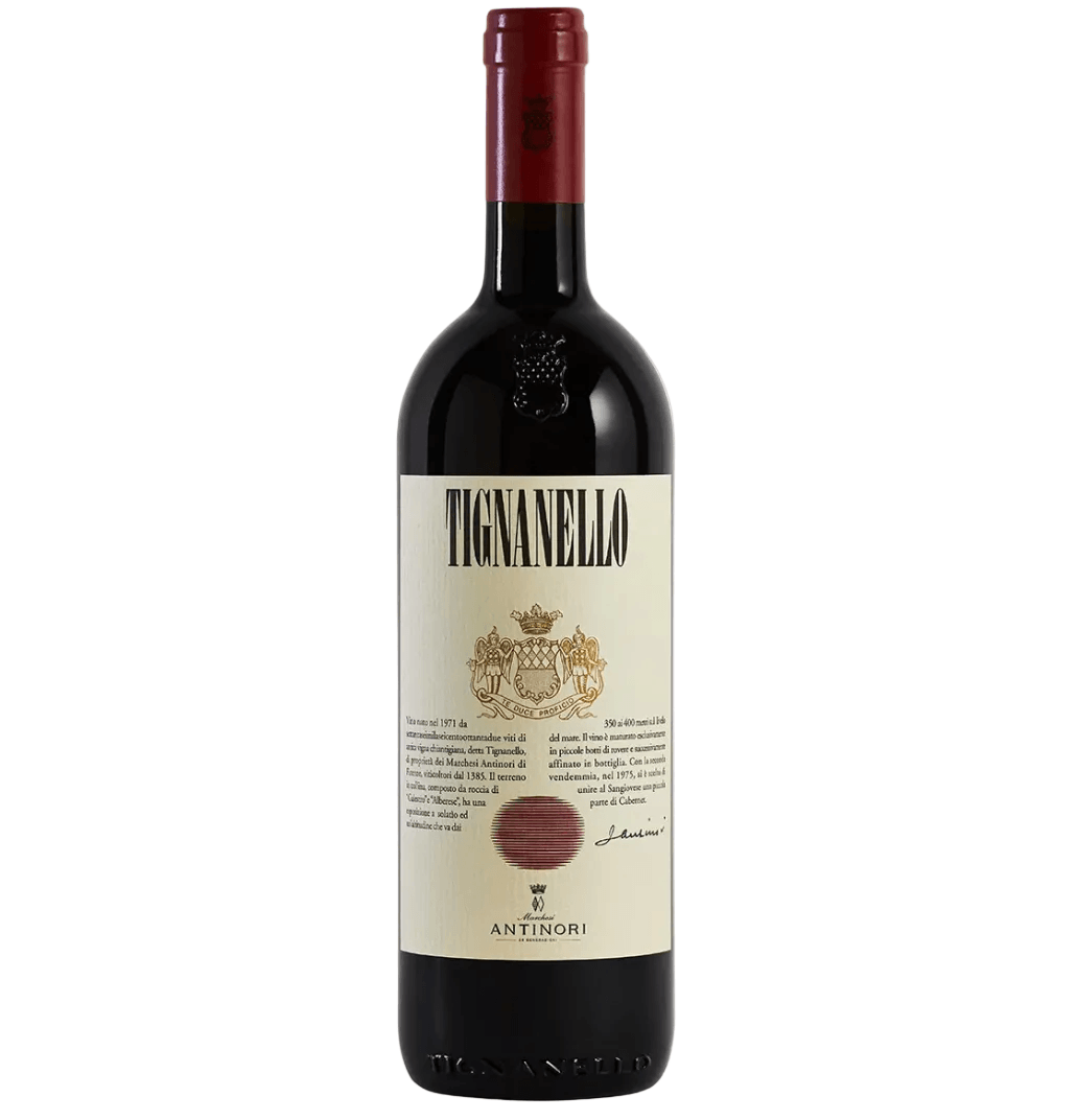 Dark glass bottle of Marchesi Antinori Tignanello Toscana IGT red wine. The bottle has a deep red foil capsule with a small gold grape bunch emblem at the top. 