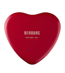 Red heart-shaped chocolate box with 'Neuhaus' branding on a white background