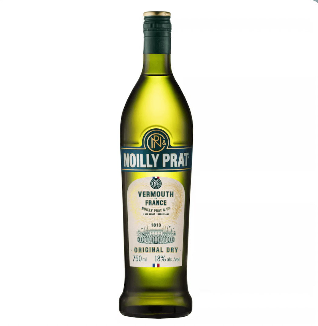 Green glass bottle of Noilly Prat Original Dry Vermouth. The bottle has a dark green screw cap with a gold band at the top. A prominent dark blue and gold neck label features the "NP" logo and "NOILLY PRAT" in white capital letters. 