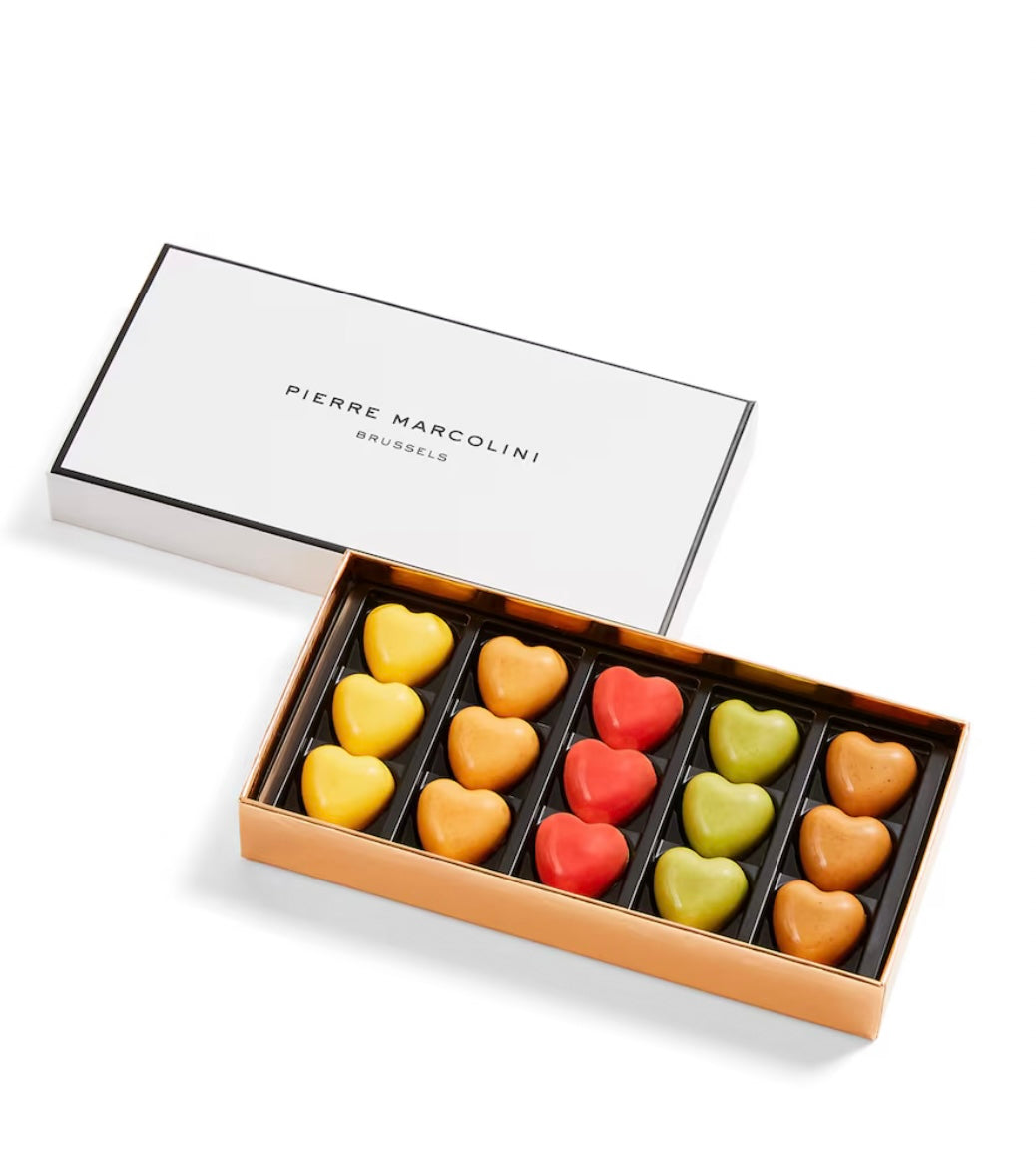 Box of heart-shaped chocolates by Pierre Marcolini on a white background