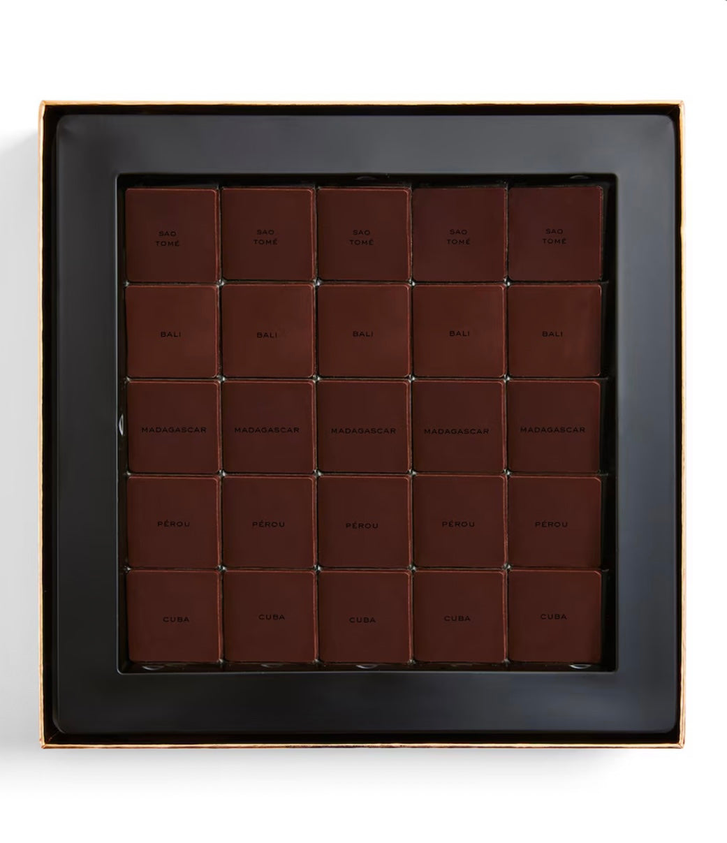 Box of chocolates with a grid pattern on a white background