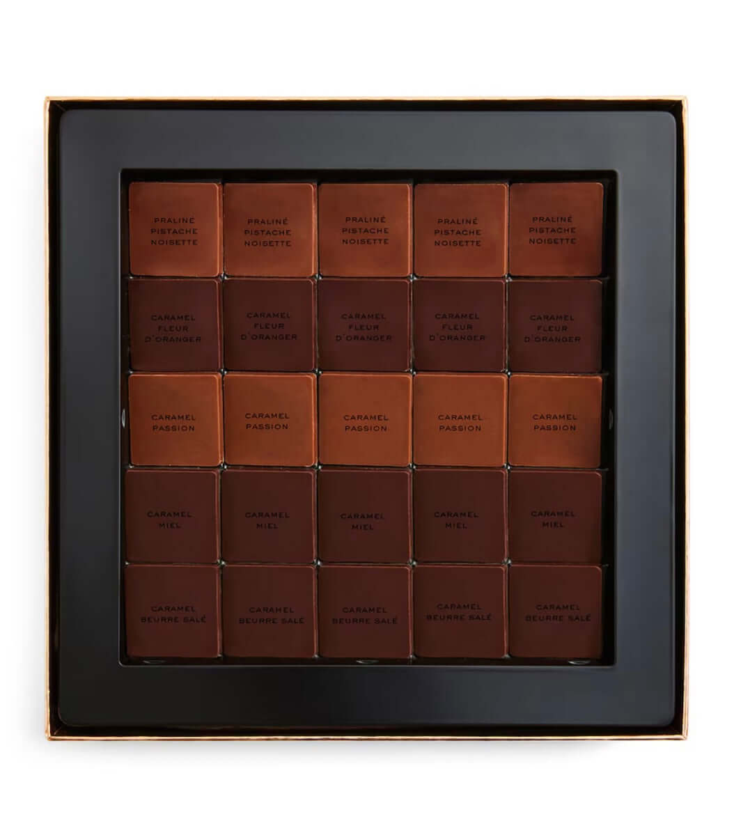 Box of Chanel Caramel Fashion chocolate bars on a white background