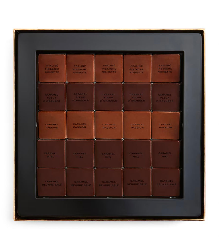 Box of Chanel Caramel Fashion chocolate bars on a white background