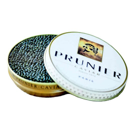 Open container of Prunier caviar on a light wooden surface