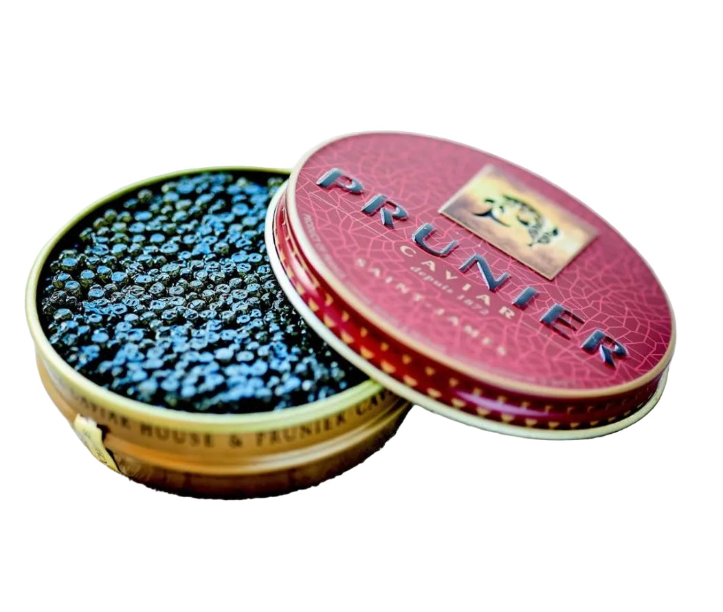 Prunier caviar tin with open lid on a textured surface