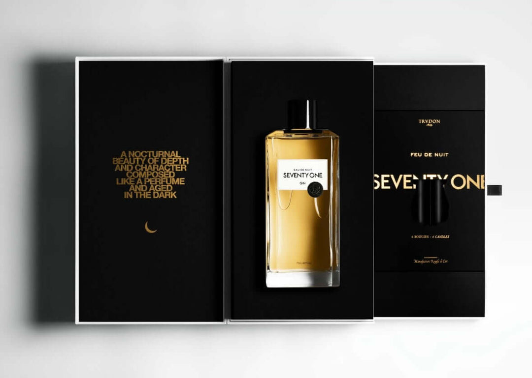 perfume-bottle-with-packaging-on-a-light-gray-background