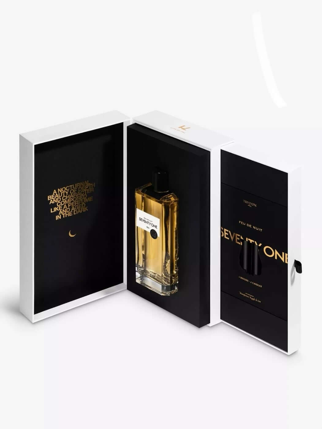Perfume bottle in an open white and black box with gold accents on a white background