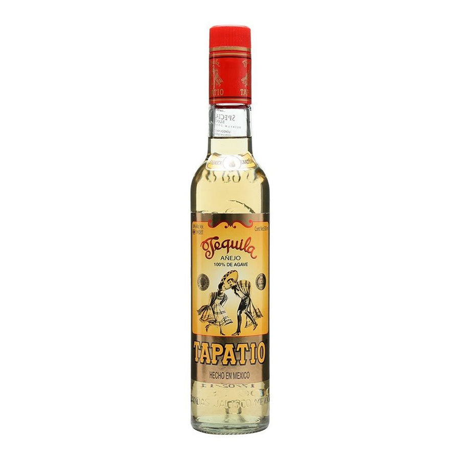 Bottle of Tapatio Añejo Tequila 50cl – amber-hued tequila in a glass bottle with a bold red and gold label, aged to perfection.