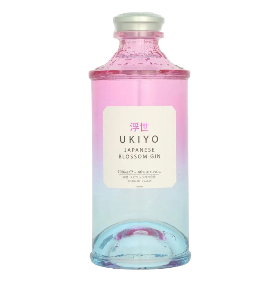 Pink-to-clear gradient glass bottle of Ukiyo Japanese Blossom Gin (700ml / 70cl). The bottle has a cylindrical shape with a rounded base and a silver screw cap. The label is a clean white rectangle with pink and black text: "浮世" (Ukiyo) in pink at the top, "UKIYO" in large black letters, "JAPANESE BLOSSOM GIN" below, followed by "700ml e ~ 40% ALC./VOL.”