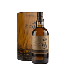 Yamazaki whisky bottle and wooden box on a white background